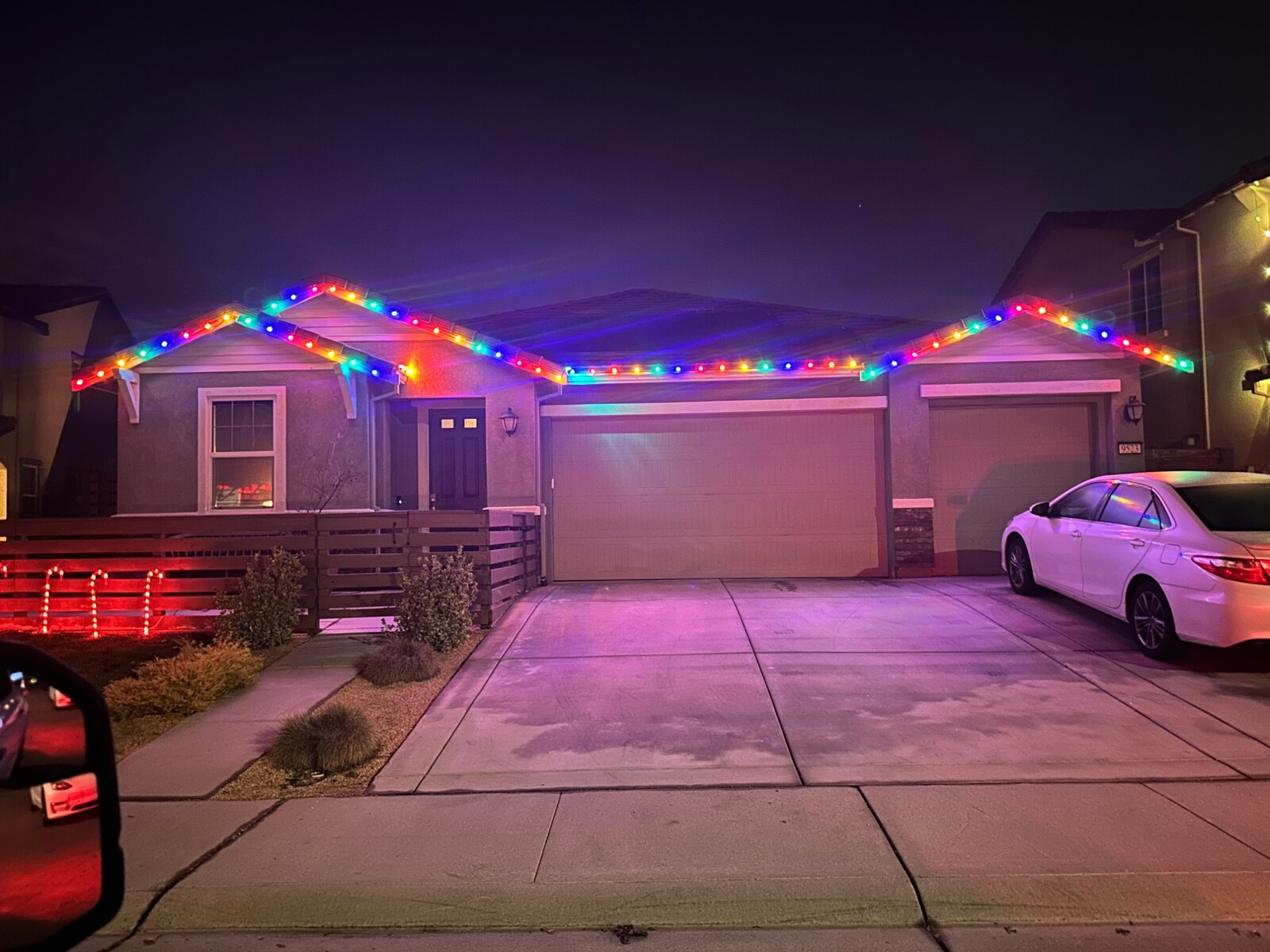 Holiday lighting in Auburn, CA: single story multicolor roofline two gables